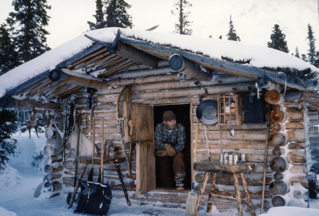 Dick Proenneke at his cabin in 1985. NPS photo taken by Richard Proenneke and donated by Raymond Proenneke