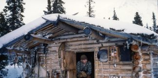 Dick Proenneke at his cabin in 1985. NPS photo taken by Richard Proenneke and donated by Raymond Proenneke